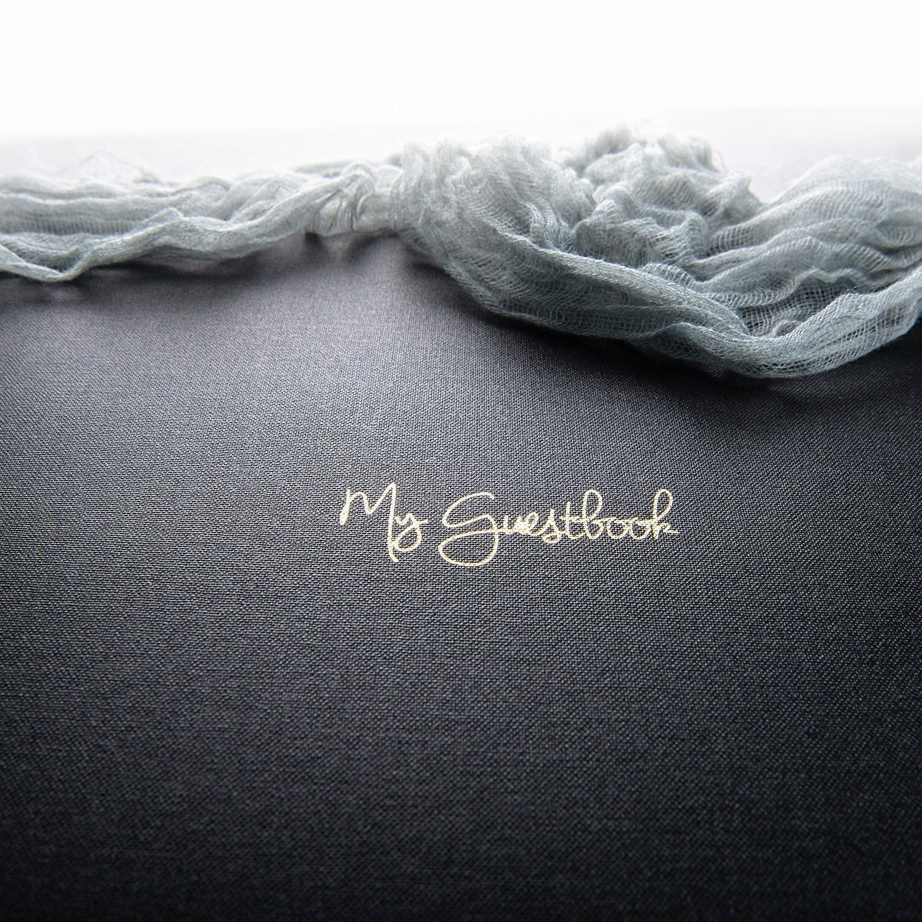 black-guestbook-with-gold-foiled-text-on-the-cover