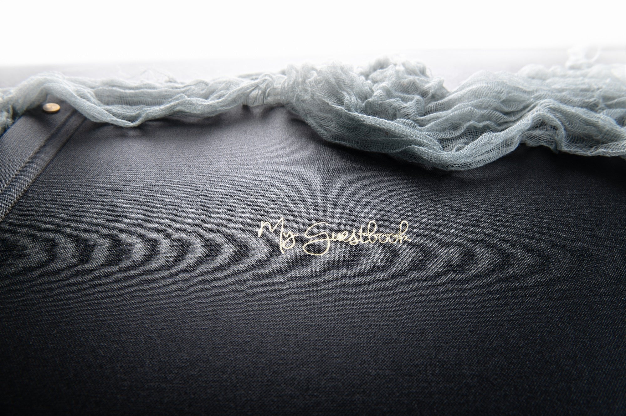 black-guestbook-with-gold-foiled-text-on-the-cover