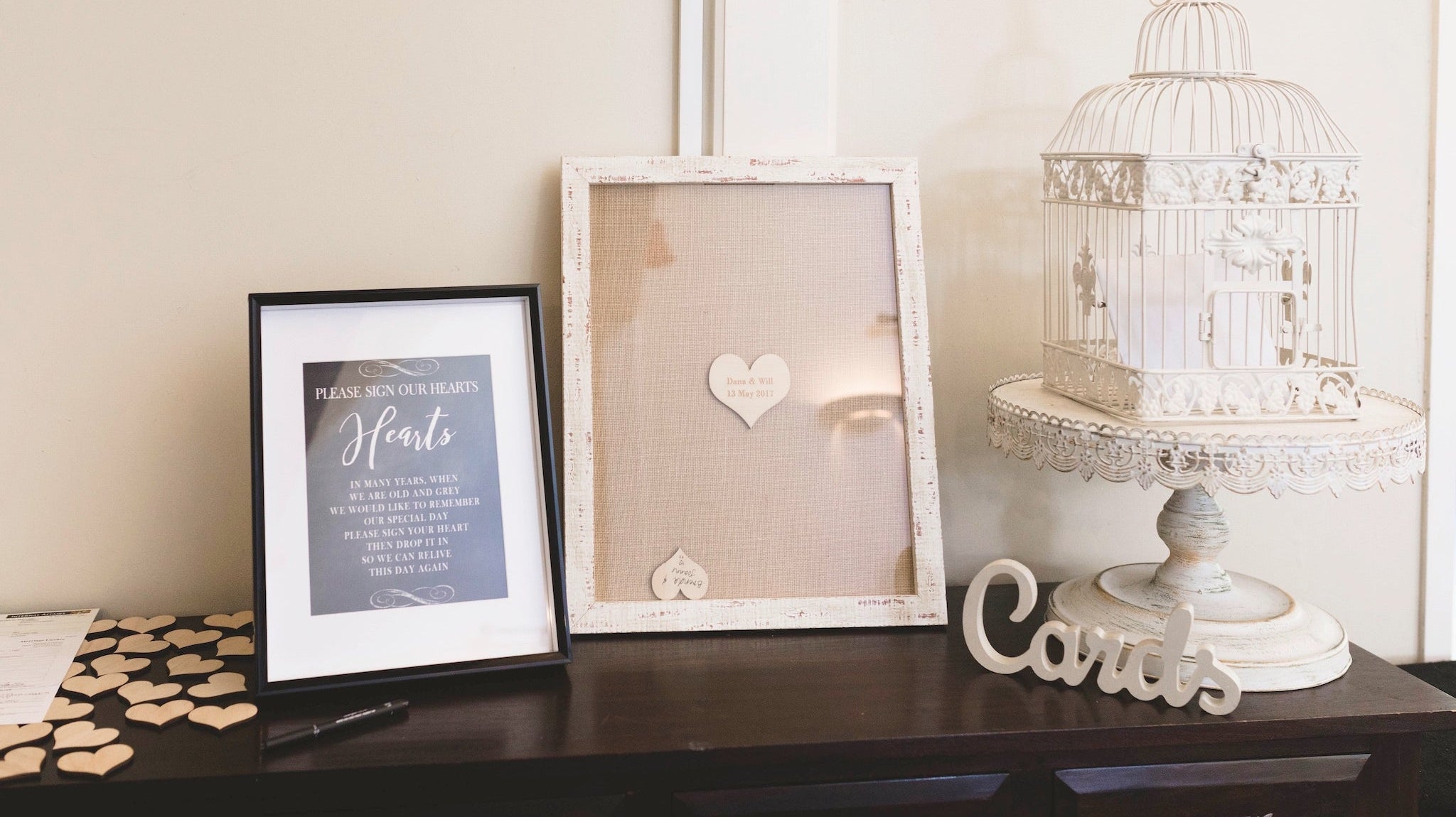 Styled wedding signing table with heart drop box guestbook and cards display