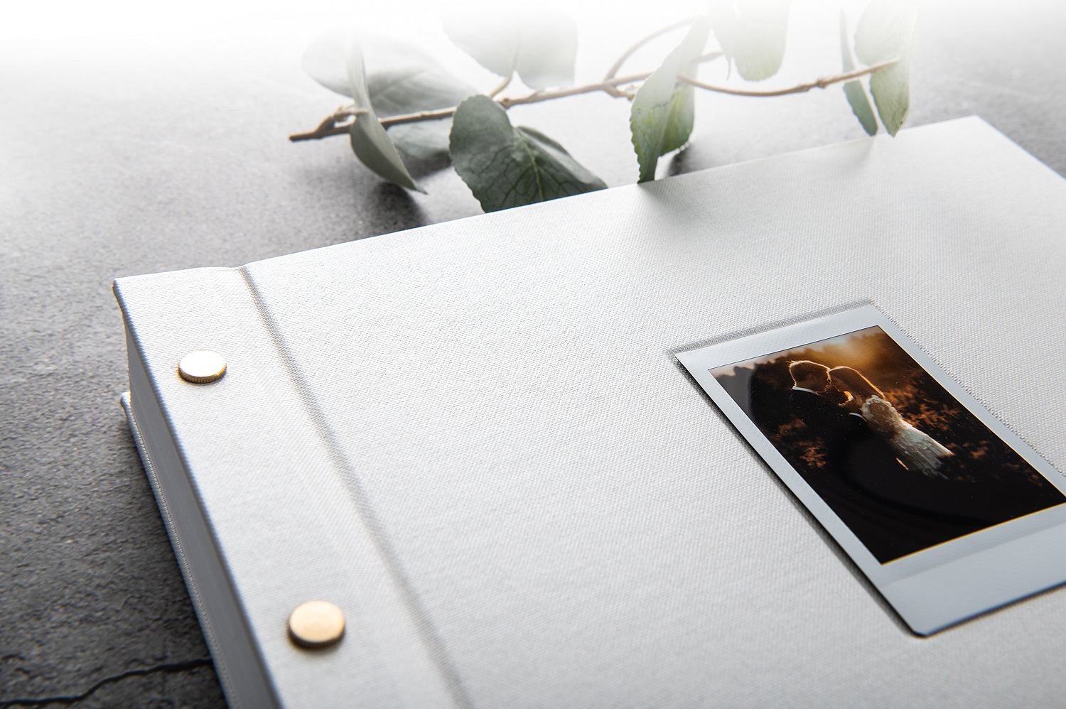 white book with instax photo on cover