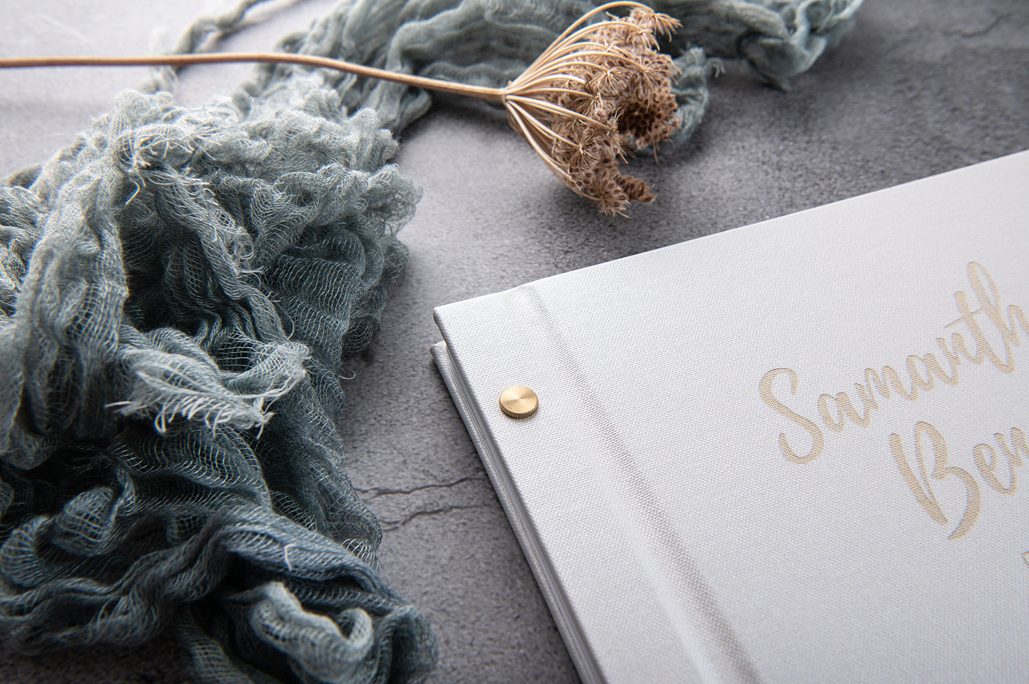 white wedding book on grey background