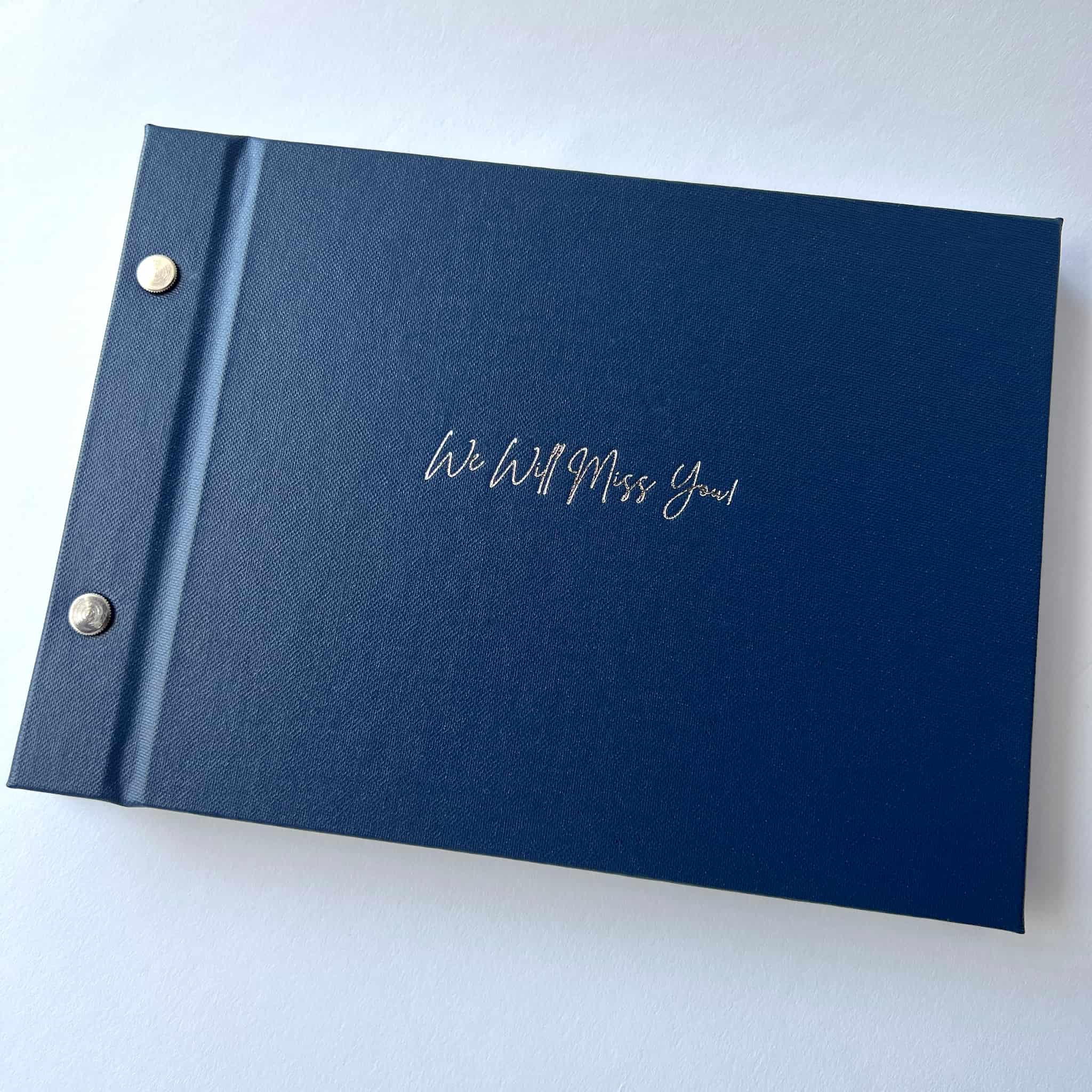 Farewell guestbook with 'We Will Miss You' foil stamped in silver on the cover