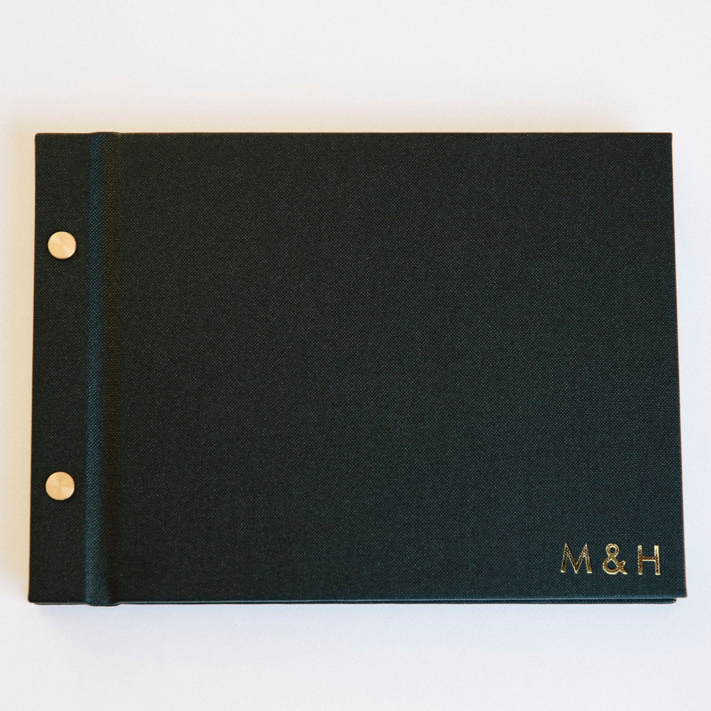 monogrammed wedding guestbook black with gold foil 
