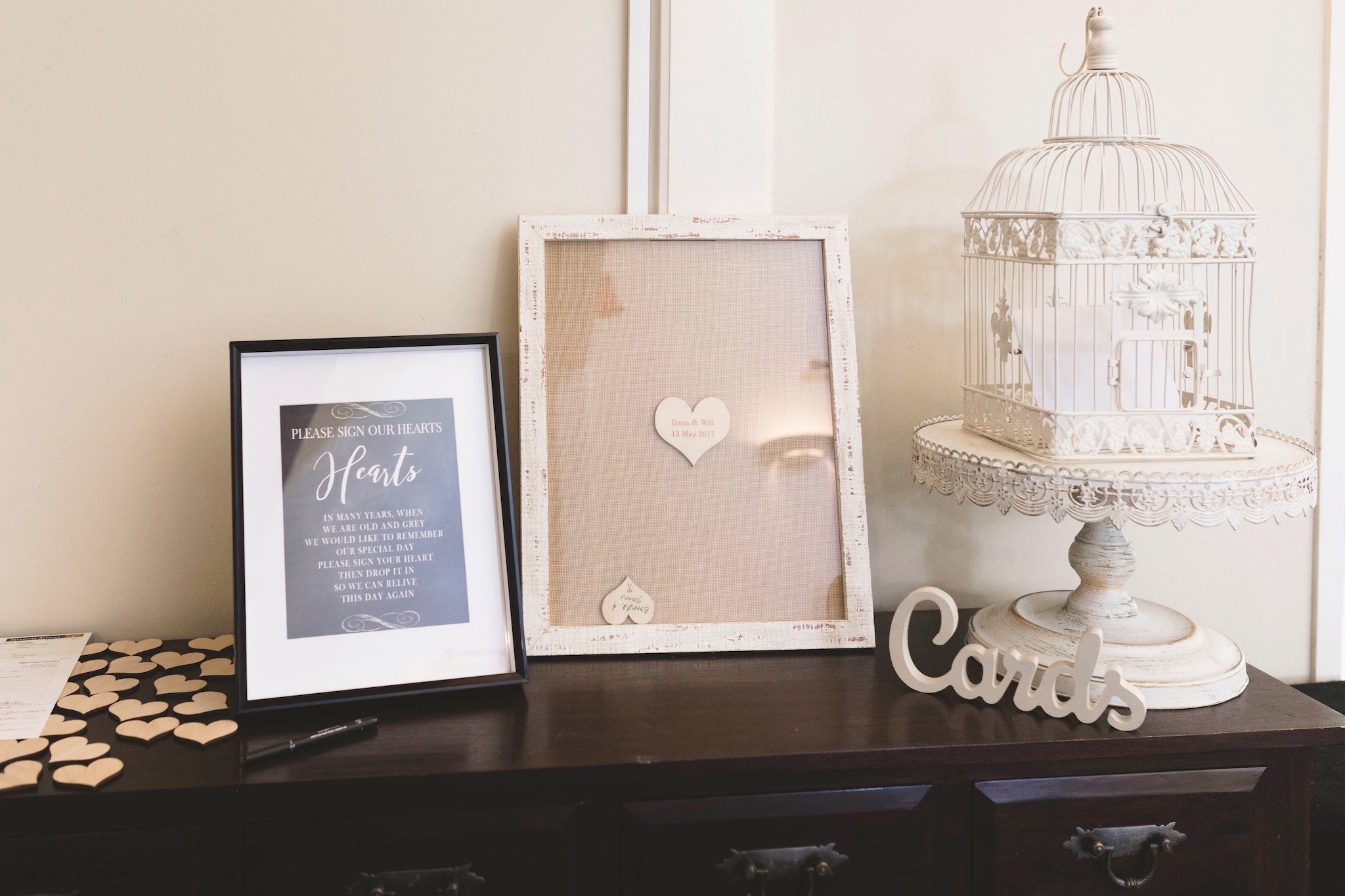 Styled wedding signing table with heart drop box guestbook and cards display