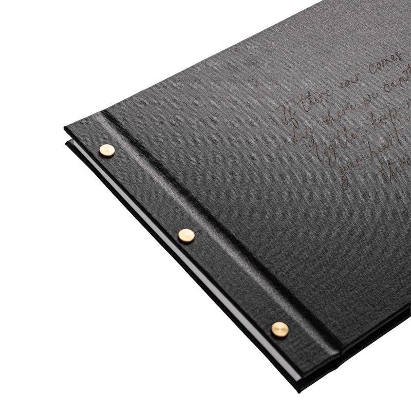 Black funeral guestbook with laser engraved handwriting quote and brass Chicago screw binding
