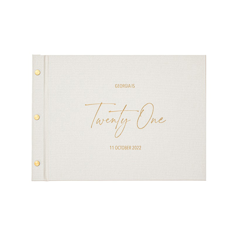 Personalised white birthday guestbook with gold foil text “Georgia is Twenty One – 11 October 2022