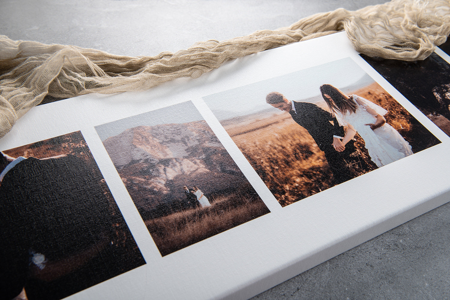 canvas print with bride and groom walking hand in hand through a field