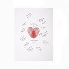Personalised fingerprint heart wedding guestbook surrounded by handwritten messages from wedding guests
