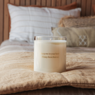 memory candle on bed