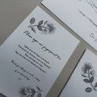 Fingerprint tree sign with floral designs on a neutral background