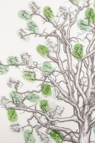 A detailed botanical guestbook illustration of an oak tree with intricate black line work and hand-painted green leaf accents on a white background, featuring handwritten signatures.