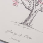 Personalised cherry blossom fingerprint wedding guestbook with couple names and wedding date printed below the tree artwork.