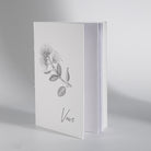 Minimal Pohutukawa wedding vow book photographed for modern wedding keepsake set