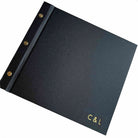 Black instax photo guestbook with gold foil monogram on a white background
